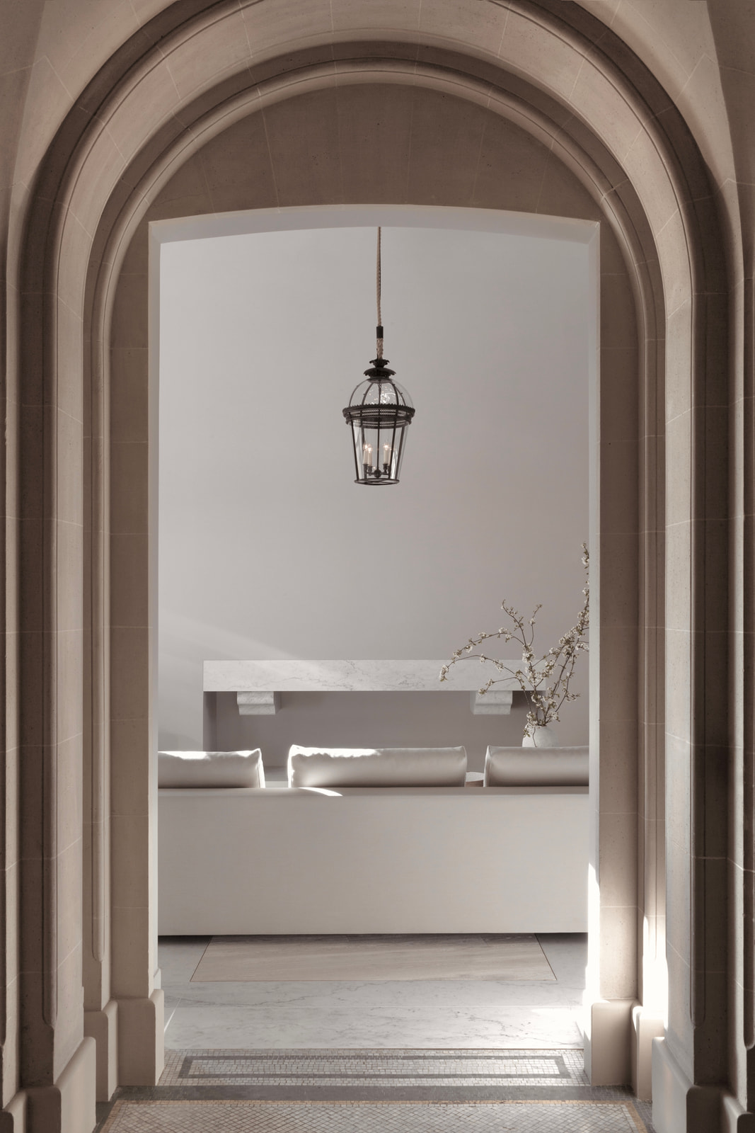 Kennedy Residence by Guillaume Alan — vaulted enfilade, hanging lantern and bathroom beyond, residence in Paris