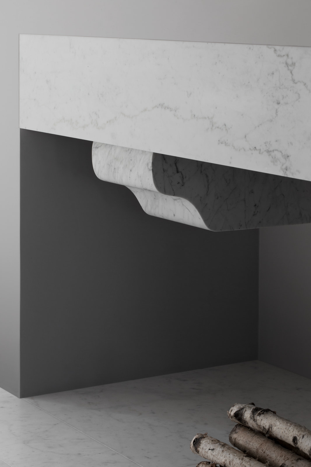 Kennedy Residence by Guillaume Alan — overhanging marble counter and birch logs, residence in Paris