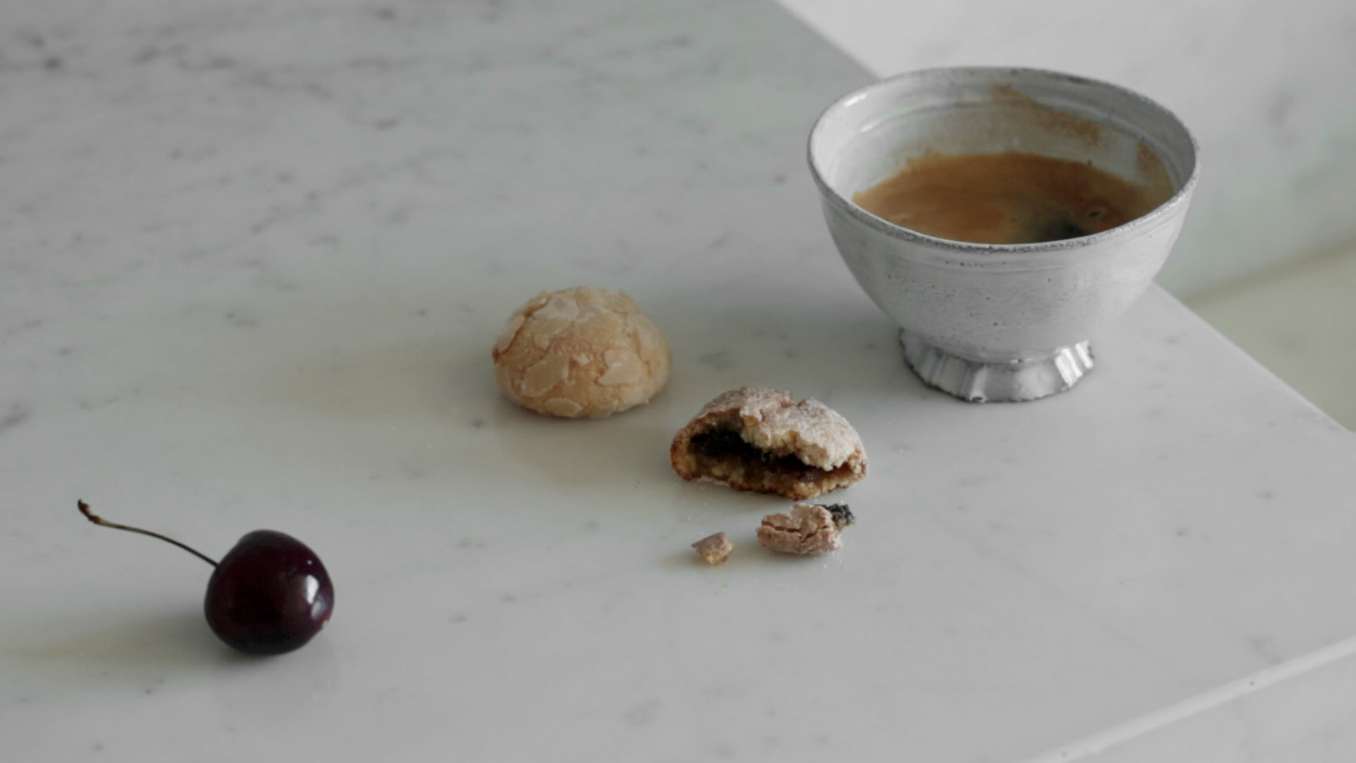 Kennedy Residence by Guillaume Alan — still life, bowl of broth, stone and cherry on the marble, residence in Paris