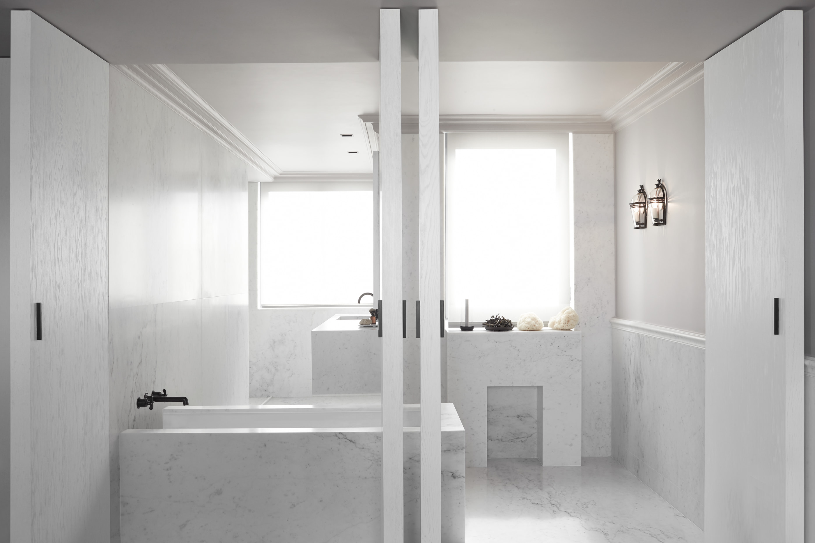 Kennedy Residence by Guillaume Alan — marble bathroom, bathtub beneath the windows, residence in Paris