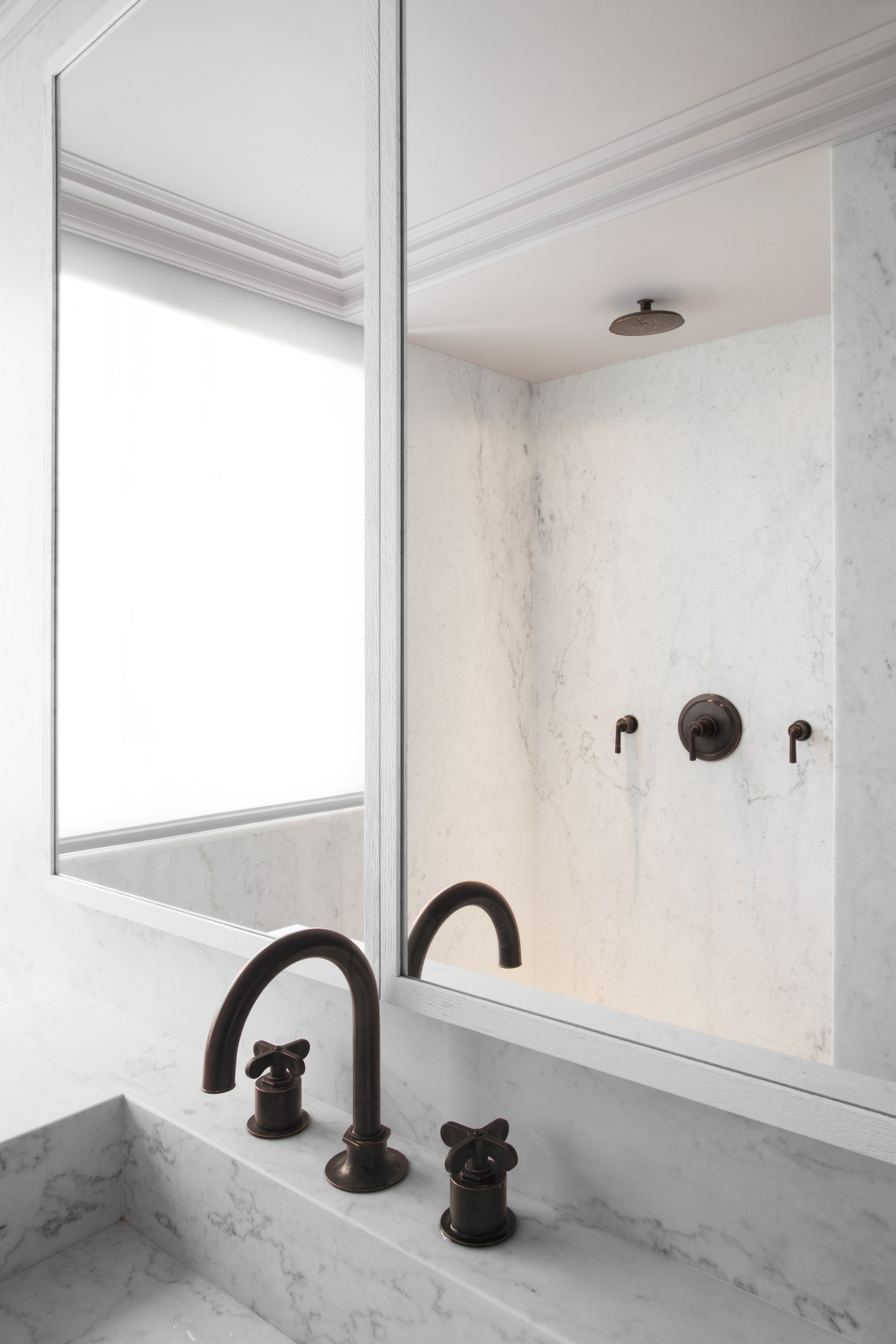 Kennedy Residence by Guillaume Alan — bathroom, marble double washbasin, black taps and mirror, residence in Paris