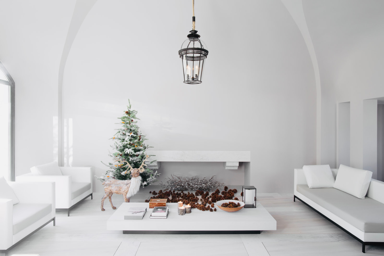 Kennedy Residence by Guillaume Alan — living room with fireplace and white sofas, residence in Paris