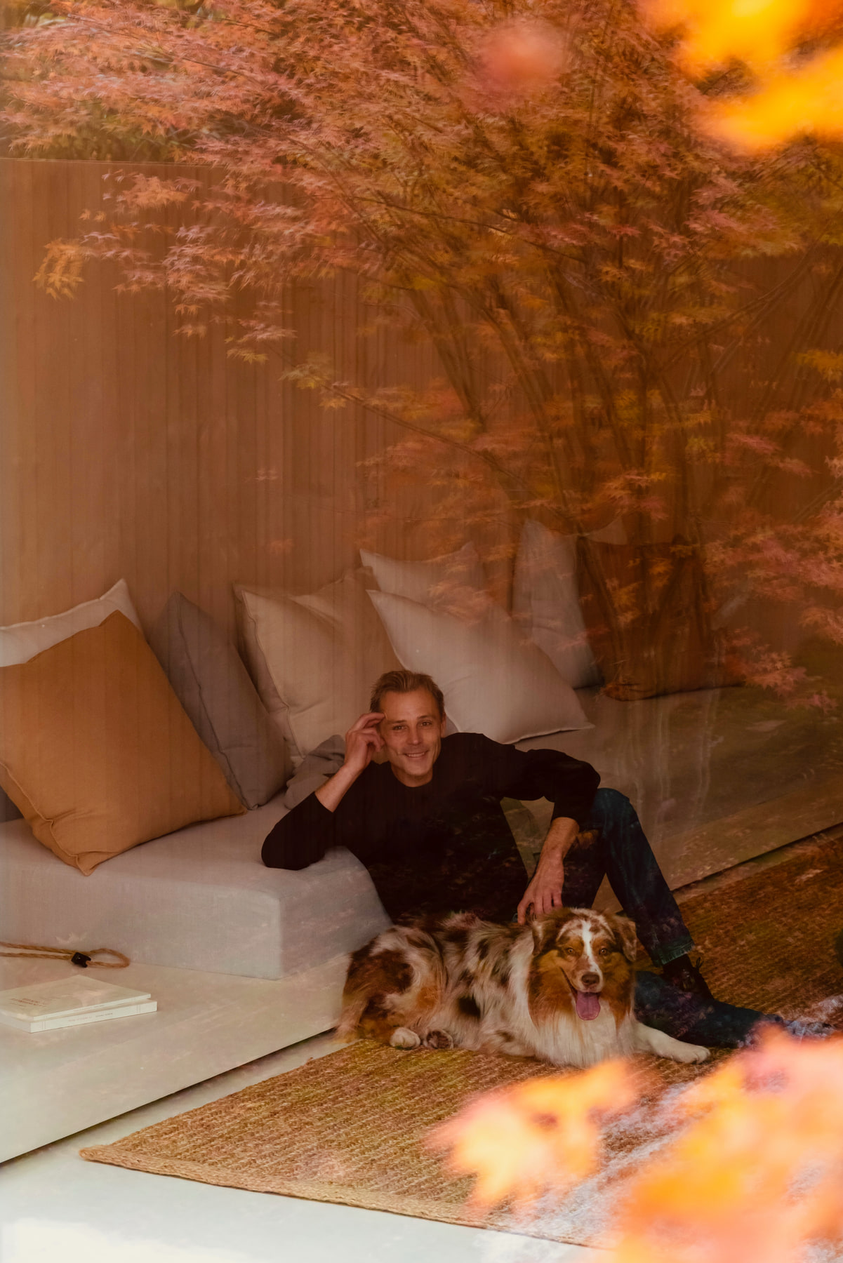 L’Imparfait by Guillaume Alan — Guillaume Alan with his dog in the living room, apartment in Paris