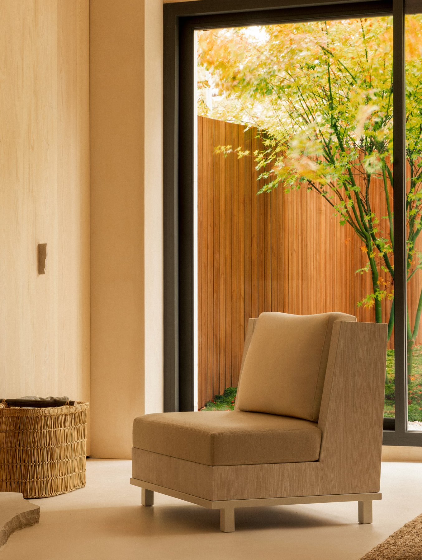 L’Imparfait by Guillaume Alan — armchair beside the window onto the garden, apartment in Paris