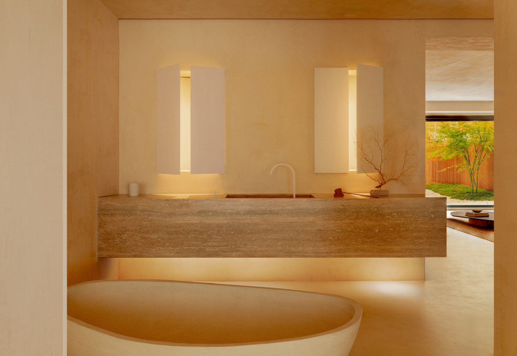 L’Imparfait by Guillaume Alan — travertine bath and vanity lit from within, apartment in Paris