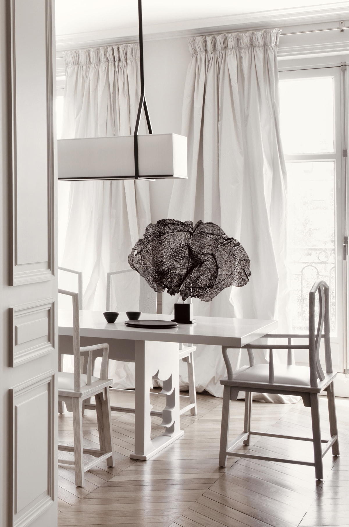 VH Penthouse by Guillaume Alan — dining room, Corian table and Ming-inspired chairs, apartment in Paris