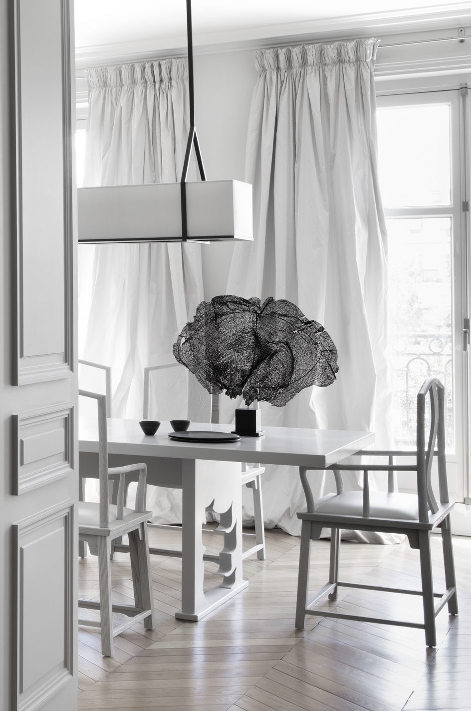VH Penthouse by Guillaume Alan — dining room with sculptural artwork, apartment in Paris